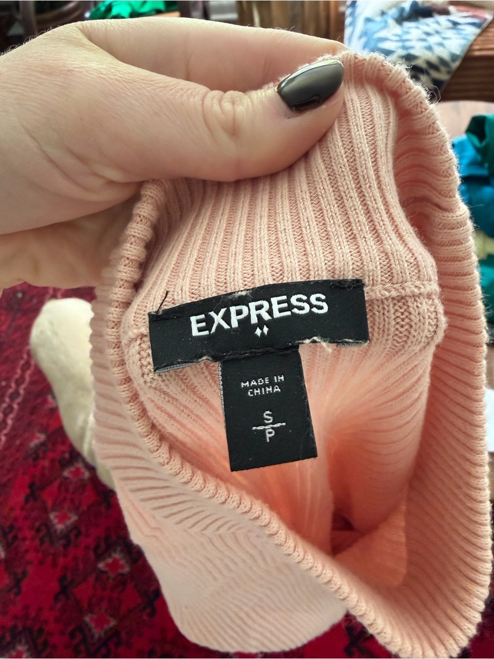 Pink ribbed Express sweater in small/petite